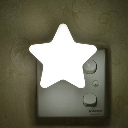 Baby Nightlight | Night Lights & Ambient Lighting | Star-shaped LED night light designed for nursery and children’s room decor.This decorative lamp provides a warm ambient glow suitable for use as accent lighting in a bedroom or nursery. Compact and light