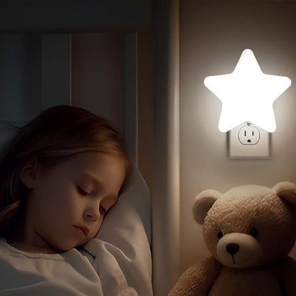 Baby Nightlight | Night Lights & Ambient Lighting | Star-shaped LED night light designed for nursery and children’s room decor.This decorative lamp provides a warm ambient glow suitable for use as accent lighting in a bedroom or nursery. Compact and light